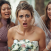 Bride looking shocked with two bridesmaids standing behind giving instructions