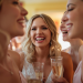 Image of a bride in background and bridesmaids smiling